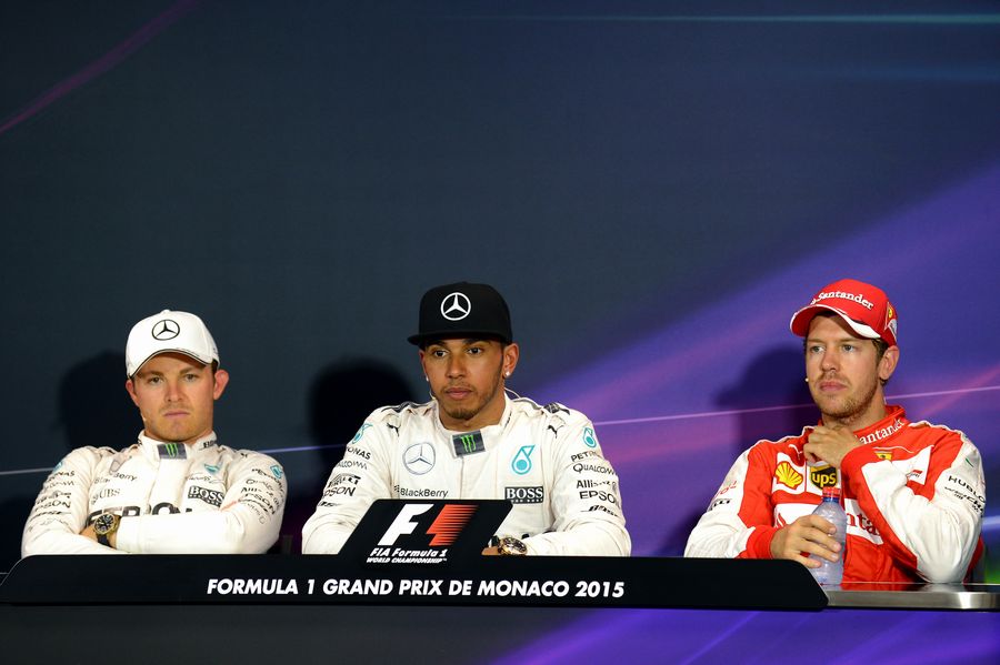 The top three drivers look on at the press conference after qualifying