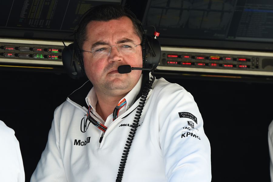 Eric Boullier watches on from the team pit wall