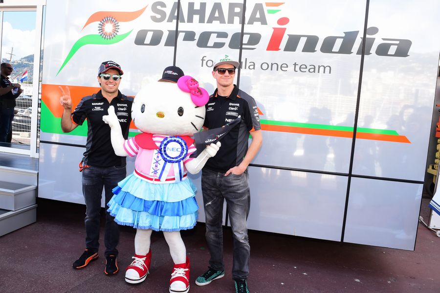 Sergio Perez and Nico Hulkenberg pose with Hello kitty
