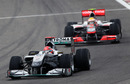 Michael Schumacher leads Lewis Hamilton