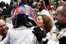Jenson Button celebrates with girlfriend Jessica Michibata