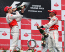 Champagne time for Lewis Hamilton and Jenson Button