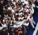 Jenson Button celebrates with his team