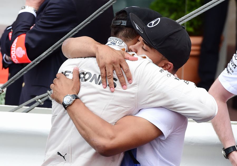 Lewis Hamilton hugs his brother Nicholas Hamilton after the podium ceremony