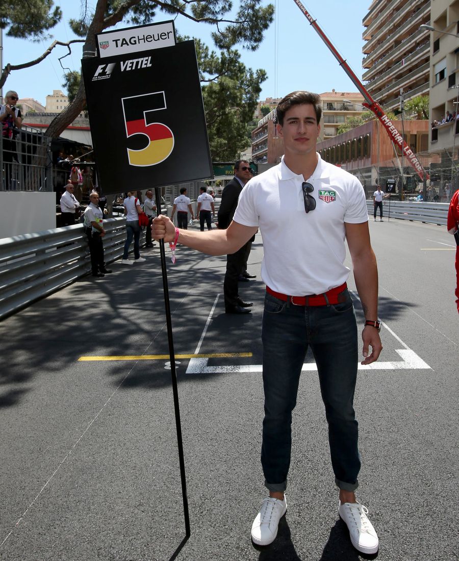 A grid boy poses ahead of the race