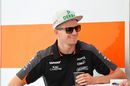 Nico Hulkenberg relaxes in the paddock