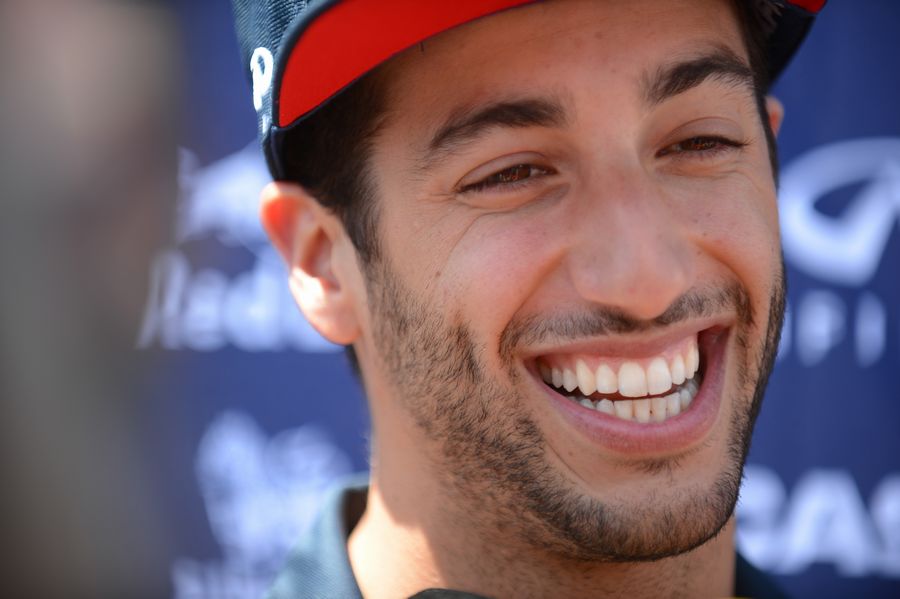 Daniel Ricciardo smiles during the media session