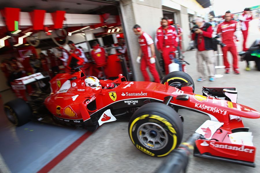 Sebastian Vettel leaves the pit