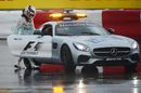 Lewis Hamilton hitches the Safety Car after his crash in heavy rain