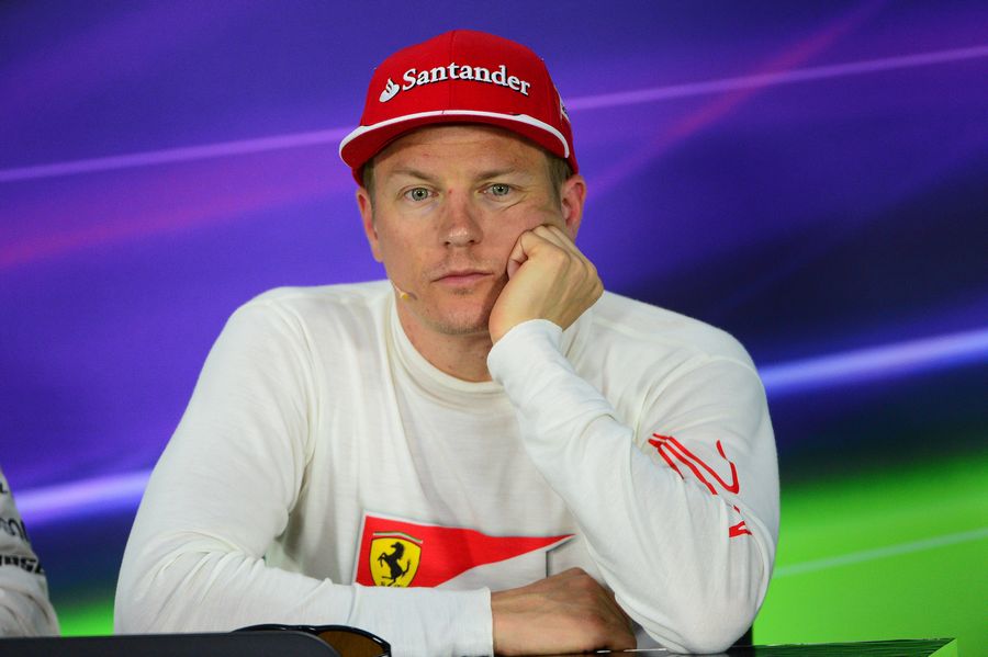 Kimi Raikkonen looks on at the press conference after qualifying