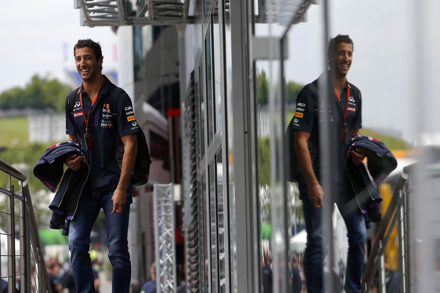 Daniel Ricciardo arrives the paddock with a smile on his face
