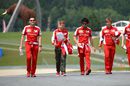 Sebastian Vettel walks the track with his engineer Riccardo Adami