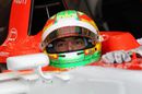 Roberto Merhi  sits in the Manor Marussia cockpit