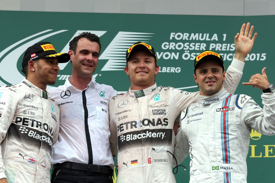 Race winner Nico Rosberg, Lewis Hamilton and Felipe Massa celebrate on the podium