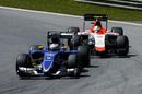 Marcus Ericsson leads Roberto Merhi