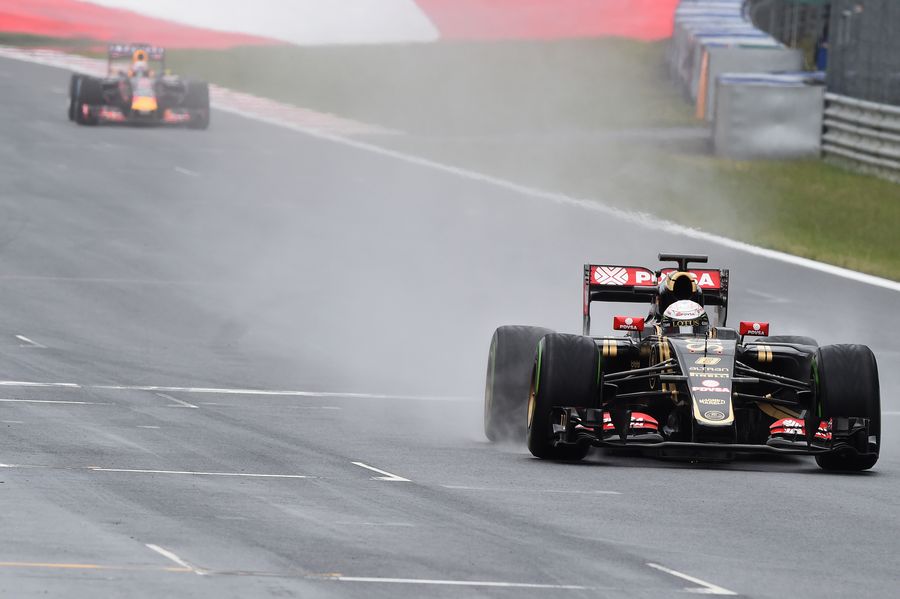 Romain Grosjean on track in the Lotus E23