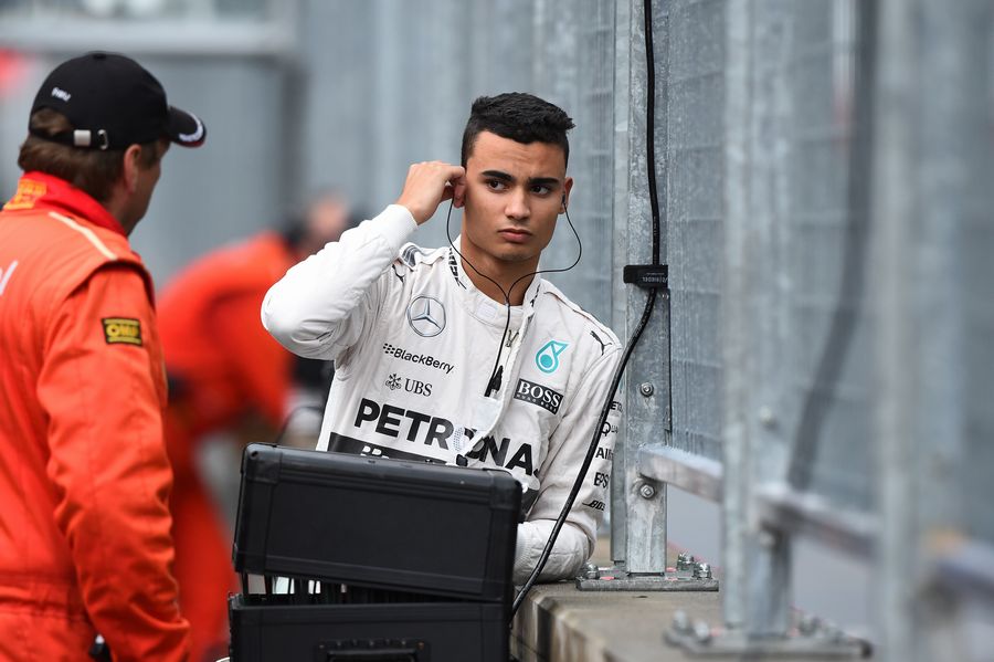 Pascal Wehrlein stands on the pit wall