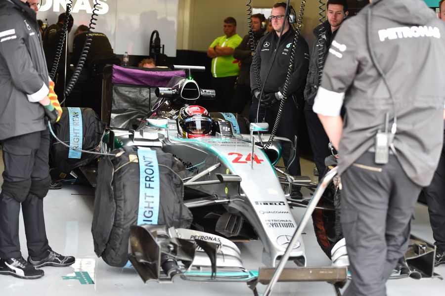 Pascal Wehrlein sits in the Mercedes W06 cockpit