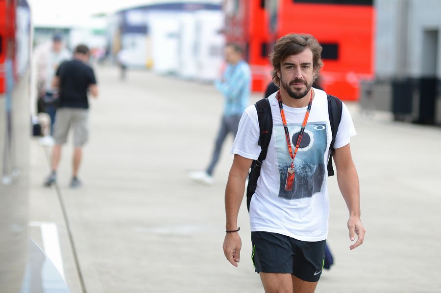 Fernando Alonso arrives the paddock