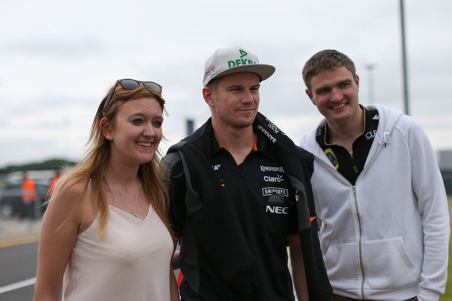 Nico Hulkenberg poses for a photograph with the fans