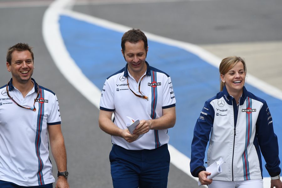 Susie Wolff walks the track with Williams engineers