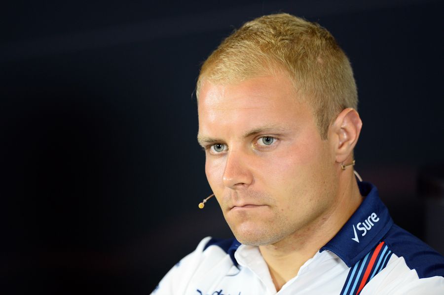 Valtteri Bottas looks on in the press conference