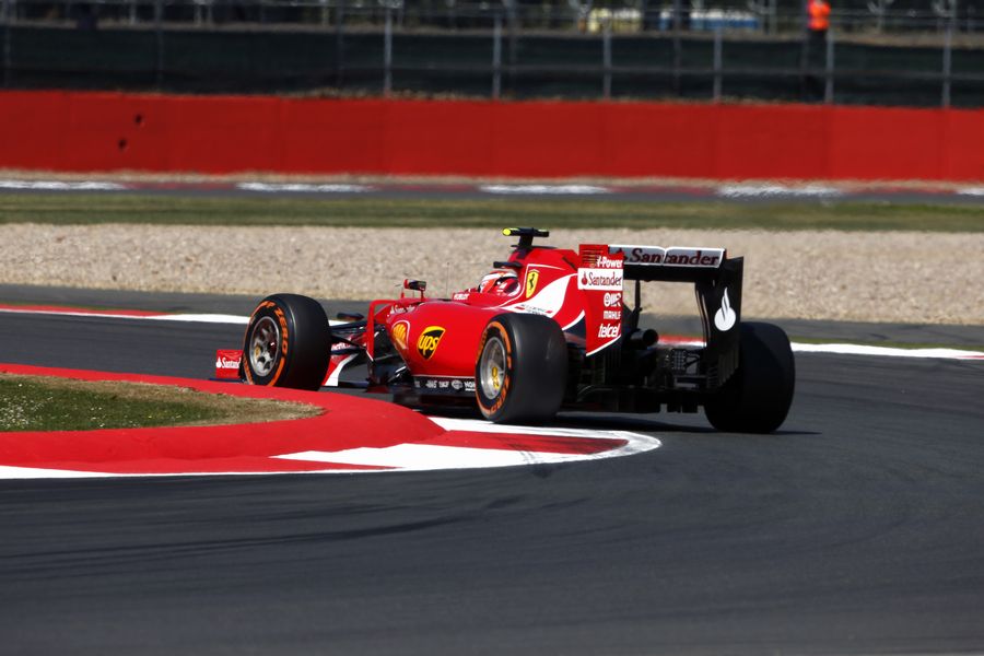 Kimi Raikkonen guides the Ferrari through a corner in FP1