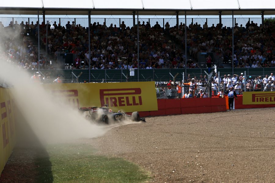 Romain Grosjean spins into the gravel in FP2