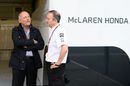 Ron Dennis talks with Jonathan Neale in the paddock