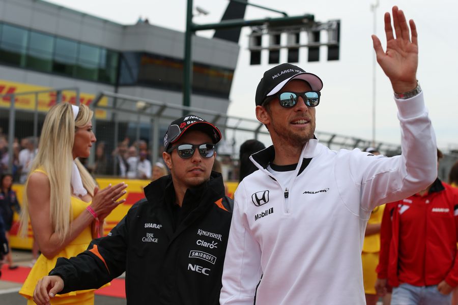 Sergio Perez and Jenson Button head off to the drivers parade