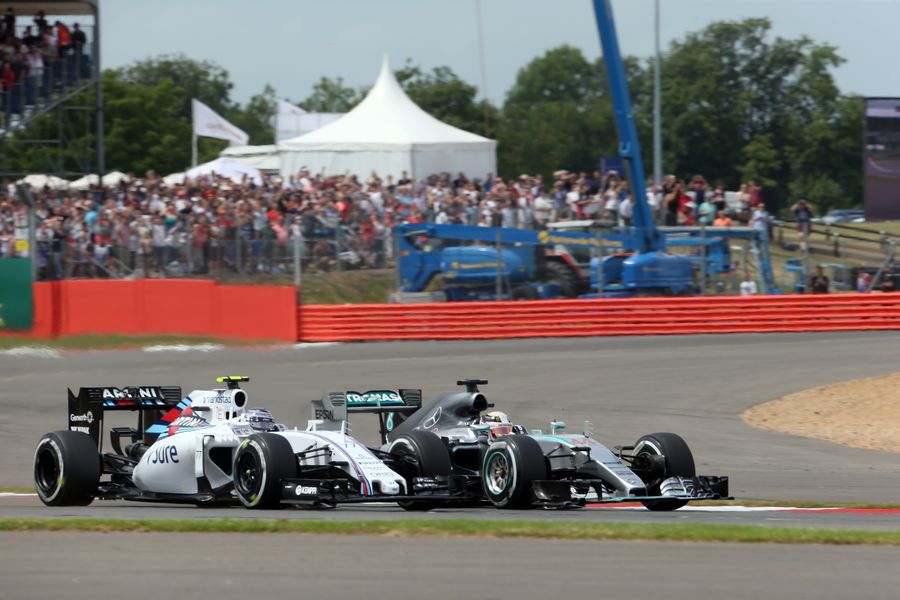 Lewis Hamilton battles for a position with Valtteri Bottas 