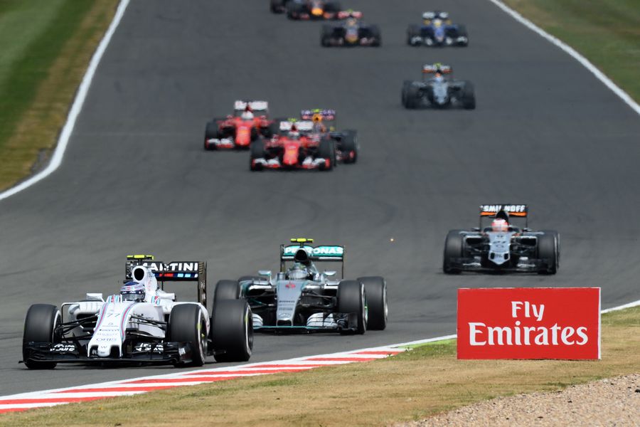Valtteri Bottas leads Nico Rosberg in the start of race