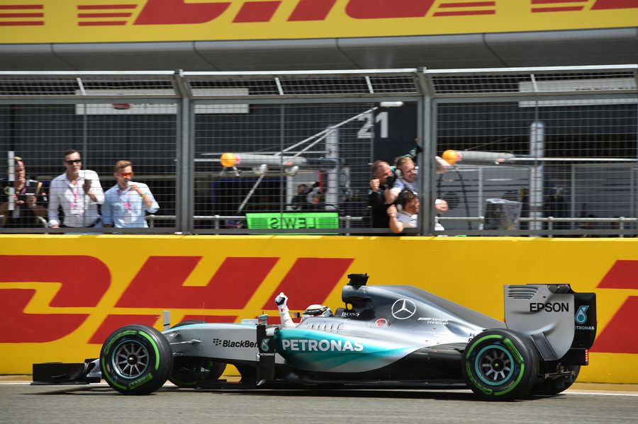 Lewis Hamilton crosses the line for his win