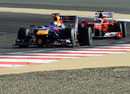 Fernando Alonso follows Sebastian Vettel on track