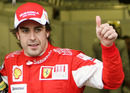 Fernando Alonso celebrates third on the grid