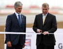 Prince Andrew opens the new Silverstone circuit watched by BRDC president Damon Hill