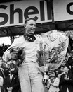 Dan Gurney celebrates his victory, the first for the Brabham marque
