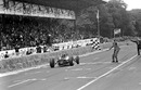Dan Gurney takes the chequered flag for Brabham's first victory