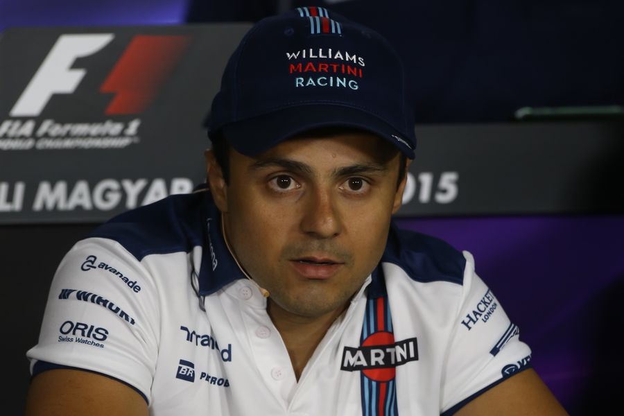 Felipe Massa talks to the media in the press conference