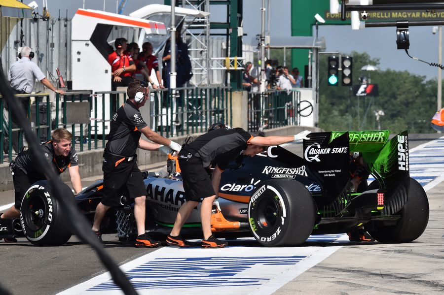 Nico Hulkenberg in the Force India with aero paint on rear wing
