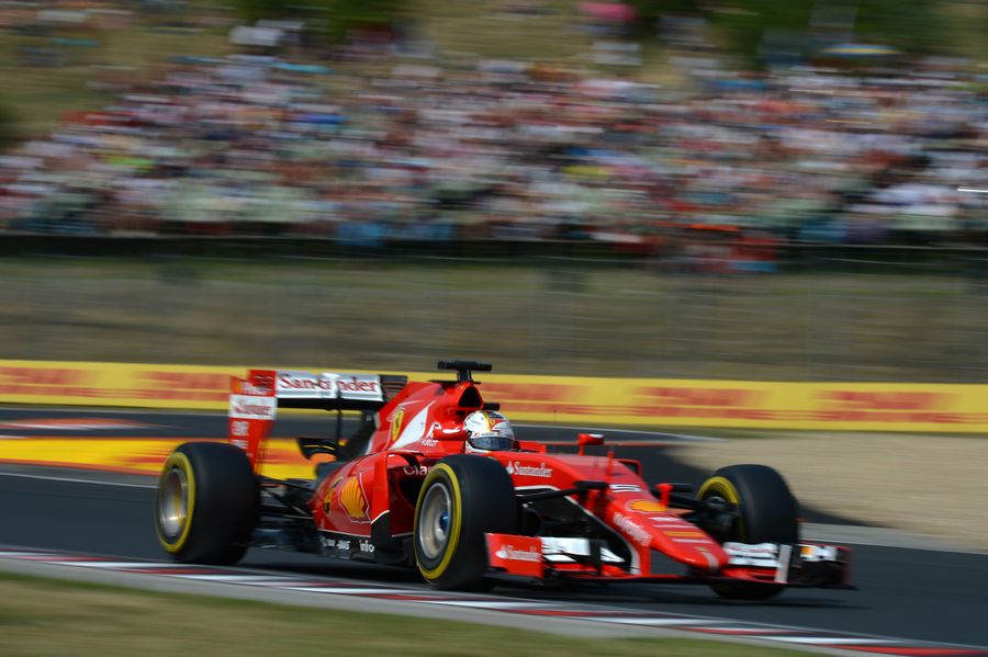 Sebastian Vettel at speed in the SF15-T
