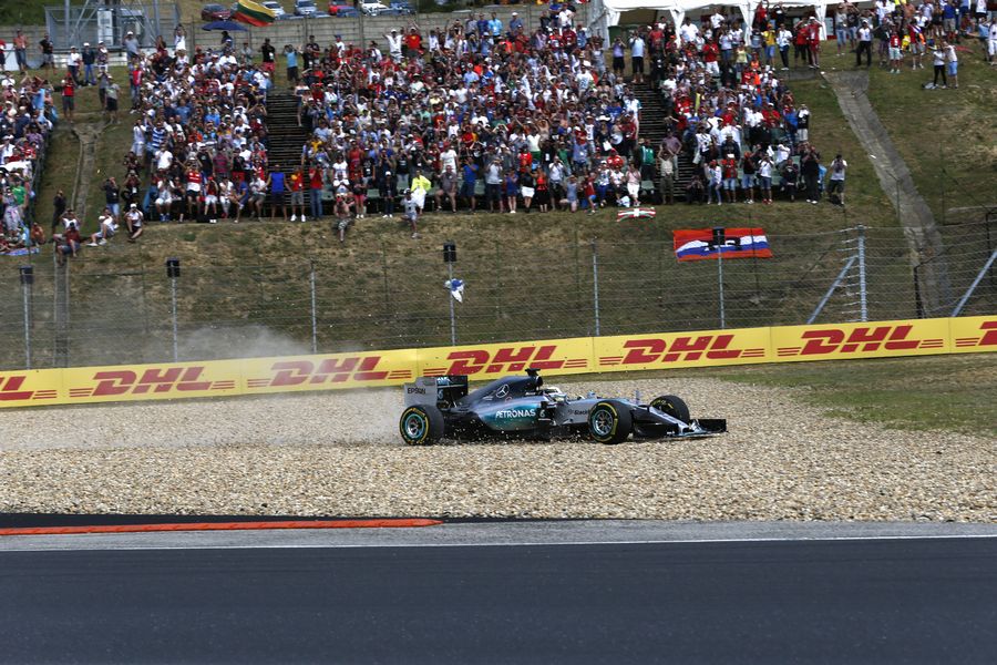 Lewis Hamilton takes a trip into the gravel
