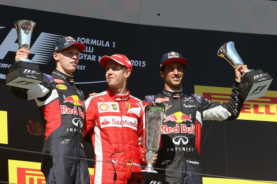 Sebastian Vettel, Daniil Kyvat and Daniel Ricciardo on the podium