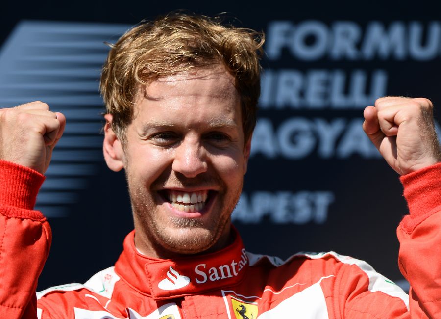 Sebastian Vettel celebrates on the Podium