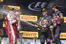 Top 3 drivers enjoy their champagne celebrate on the podium