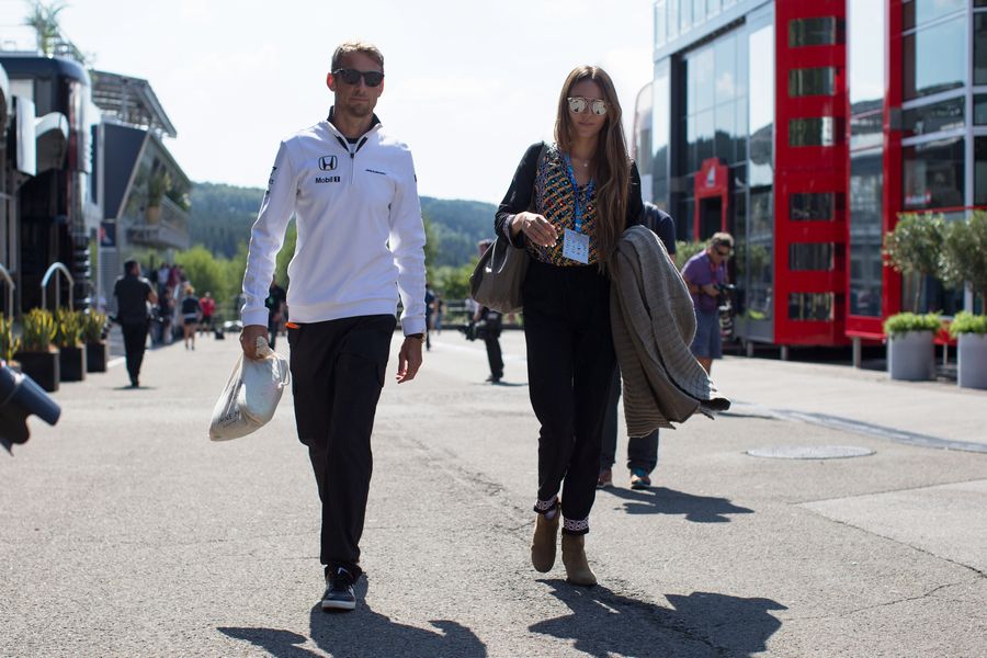 Jenson Button and his wife Jessica Button arrive at the paddock