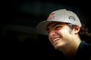 Carlos Sainz looks relaxed in the paddock