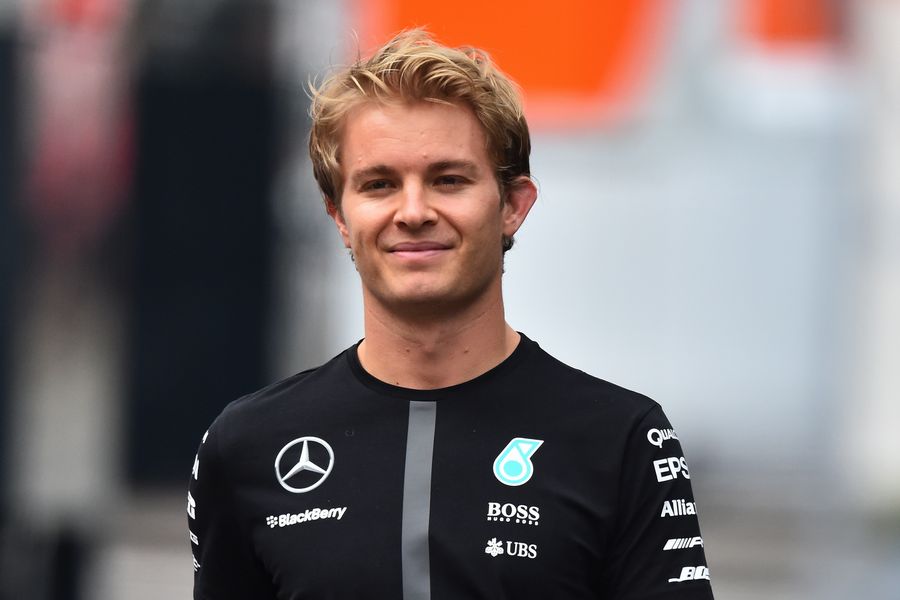 Nico Rosberg walks through the paddock