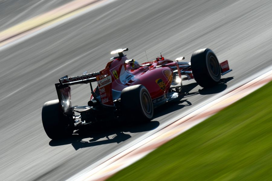Sebastian Vettel works hard to keep pace