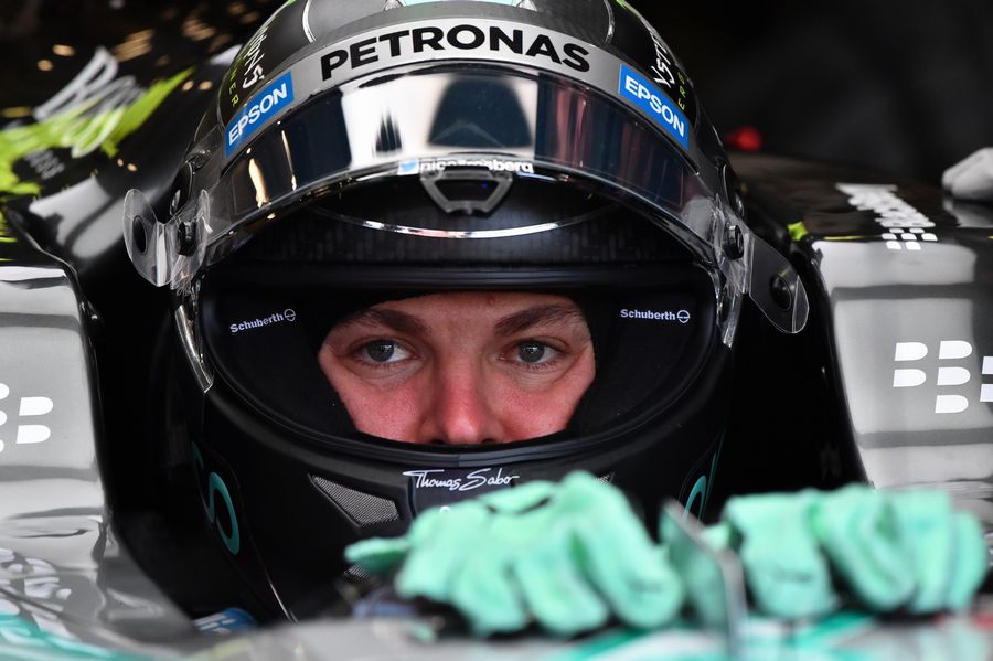 Nico Rosberg sits in the Mercedes cockpit